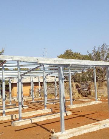 PV mounting structures installation at Kalya village in Kigoma region. The plant is composed of 7 PV structures which produces 28kWp for more than 350 houses which are off- grid.